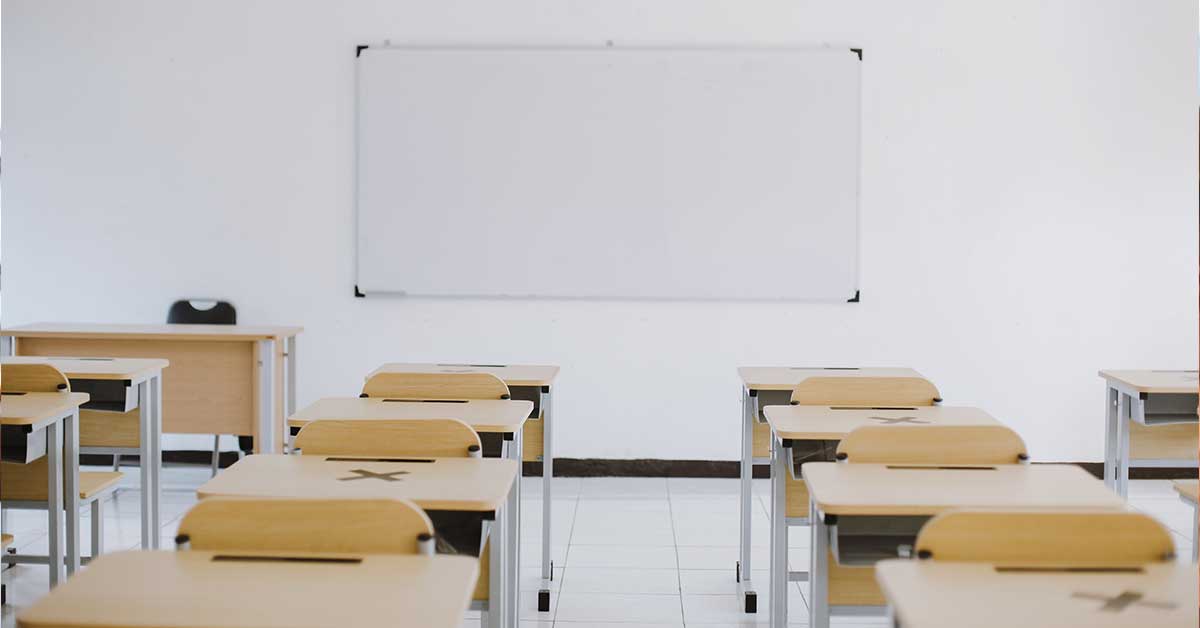 An empty classroom symbolizes the educator shortage crisis